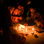 Children Lighting Candles