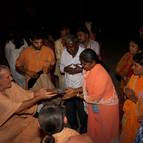 Srila Guru Maharaja Presenting Gifts and Maha-prasada to Guests