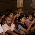 Devotees Offering Lamps to Damodara