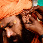 A Hindu Holy Man Gets His Ears Cleaned