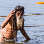 Old Sadhu Bathing in the Ganga