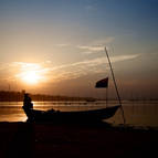 A Lone Boat at Dusk