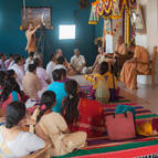 Devotees Hearing from Guru Maharaja