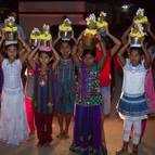 Kumaris Carrying Auspicious Pots, Greeting the Devotees on Arrival at the Temple