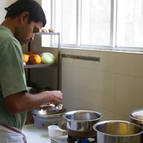 Syamasundara preparing puspanna rice